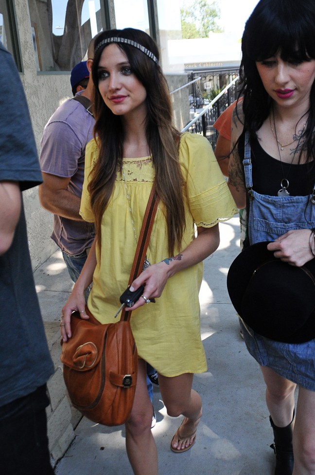 Ashlee Simpson Wentz yellow dress, flip flops, headband, brown purse